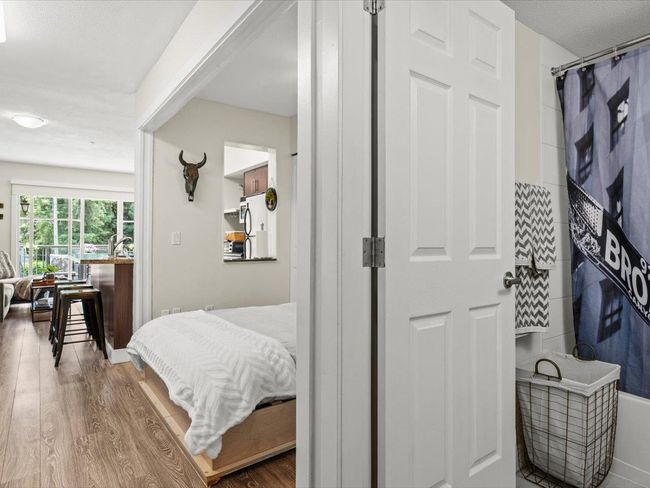 Bedroom featuring wood finished floors | Image 10