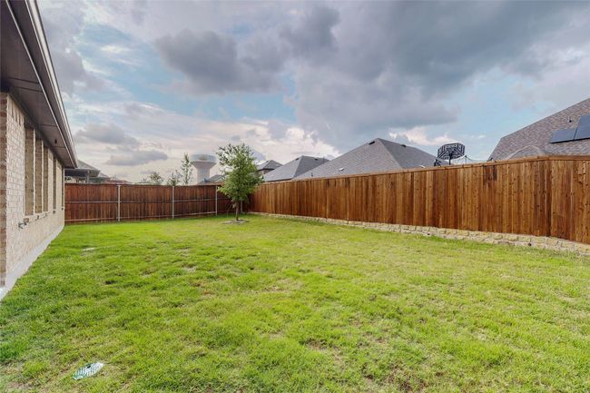 View of yard featuring a fenced backyard | Image 39