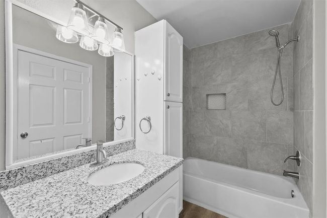 Primary ensuite with built in shelving. | Image 13