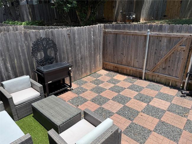 View of patio with outdoor lounge area | Image 19