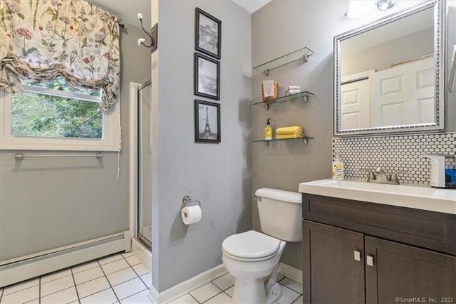 Main Floor - Full Bath with Washer and Dryer | Image 19