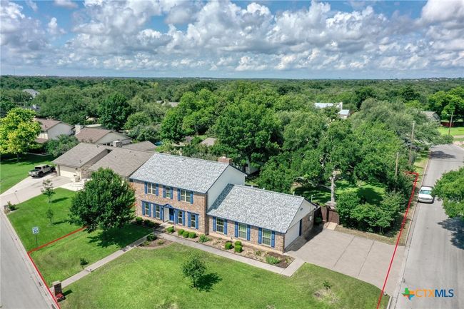 Aerial view of home on almost a half-acre corner lot. | Image 31