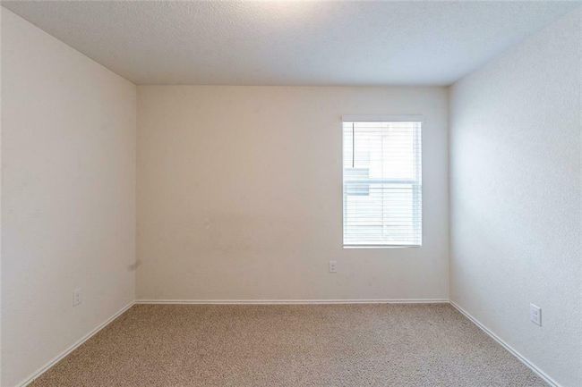 Spare room with light carpet | Image 14