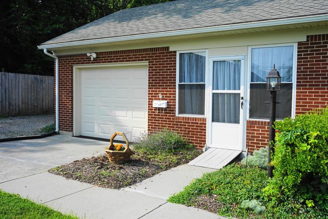 Enclosed Breezeway leads to Garage | Image 10