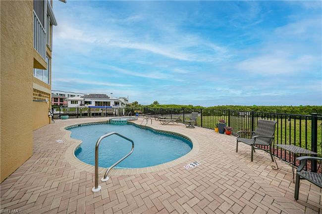 View of pool featuring a patio area | Image 41