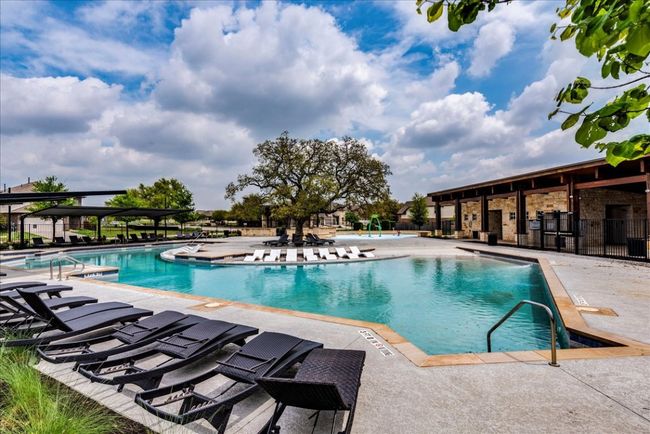 Community pool featuring a patio area | Image 36