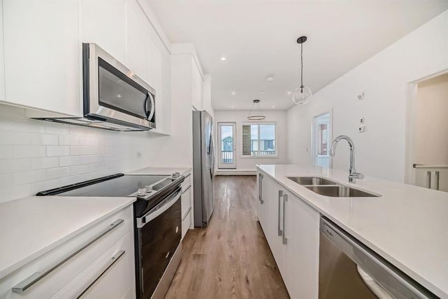 3117 - 6 Merganser Drive W, Condo with 3 bedrooms, 2 bathrooms and 2 parking in Chestermere AB | Image 4