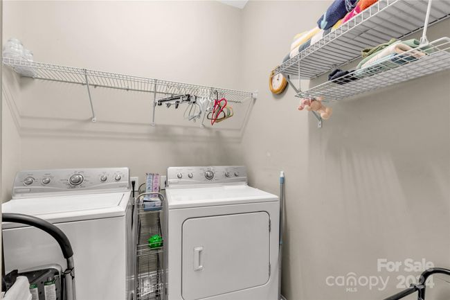 Laundry room with additional storage space | Image 19