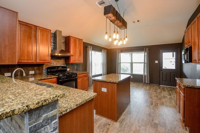 Easy access to the living room and outdoors. | Image 12