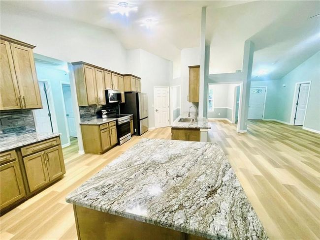 7675 Lanier View Rdg, House other with 3 bedrooms, 2 bathrooms and 2 parking in Cumming GA | Image 5