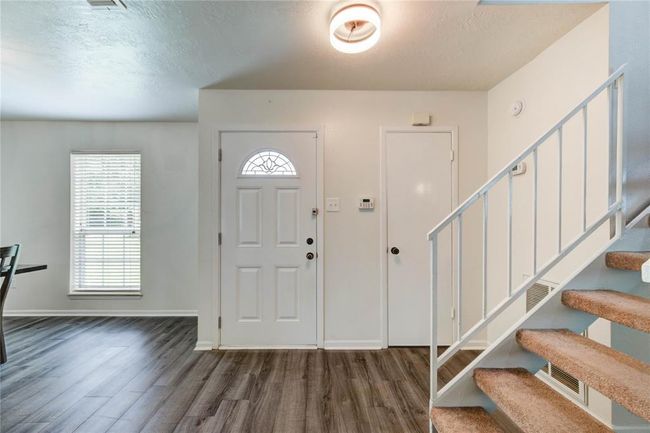 Stunning Entry with Beautiful LV Flooring! | Image 13