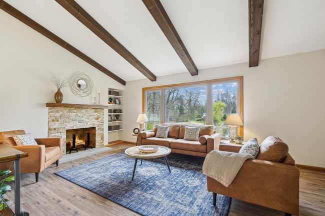 Open and light filled living room. | Image 4