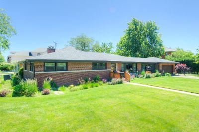 7055 N Kilbourn Avenue, House other with 6 bedrooms, 2 bathrooms and 2 parking in Lincolnwood IL | Image 1