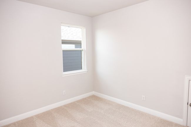 Carpeted empty room with baseboards | Image 15