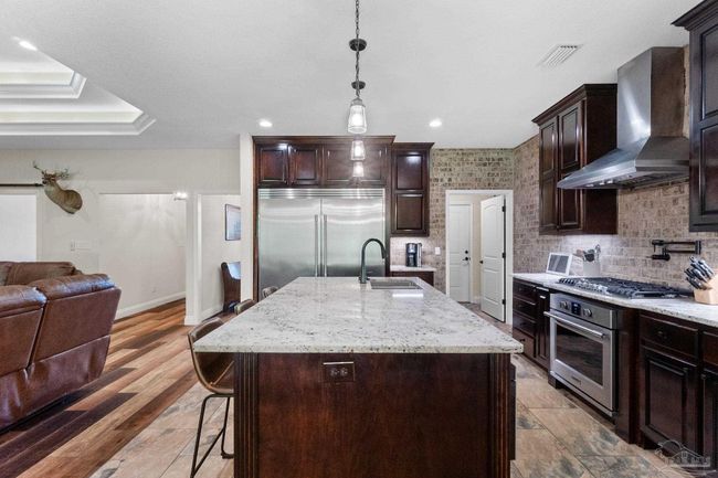 9241 Sage Forest Ln, House other with 3 bedrooms, 3 bathrooms and 2 parking in Pace FL | Image 8