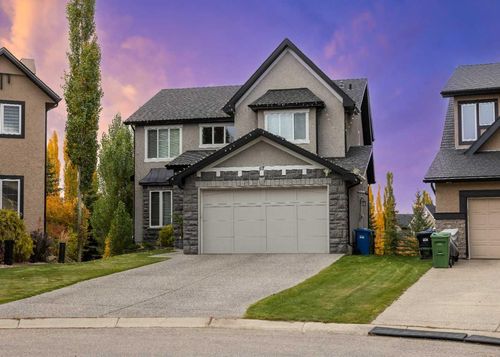 67 Tusslewood View Nw, Home with 4 bedrooms, 3 bathrooms and 4 parking in Calgary AB | Card Image