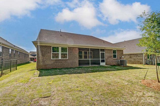 View of Back of House with Screened Porch-Photo similar to Subject Property | Image 22