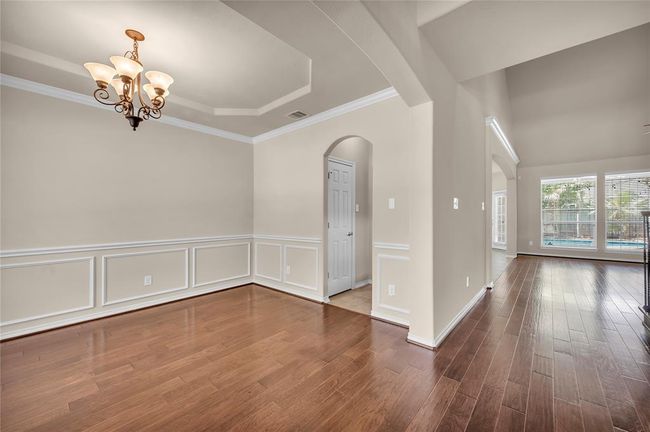 Formal dining room seamlessly connects to a convenient butler's pantry. | Image 8