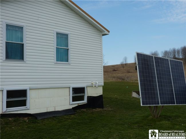 Side of house with solar panel | Image 32