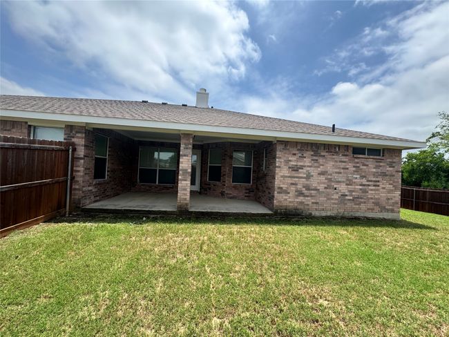 Back of house with a patio area and brick siding | Image 16