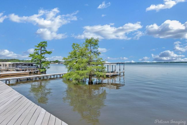 View of dock with boat lift and a water view | Image 36