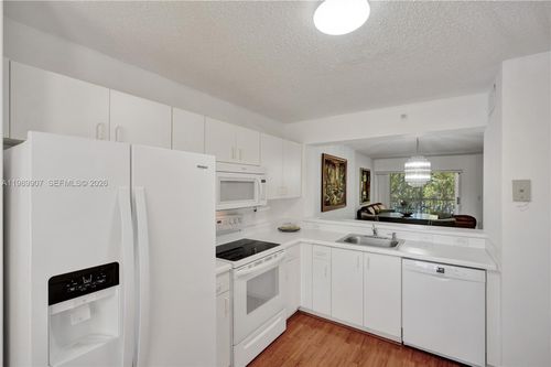 g306-9511 Weldon Cir, Tamarac, FL, 33321-0920 | Card Image