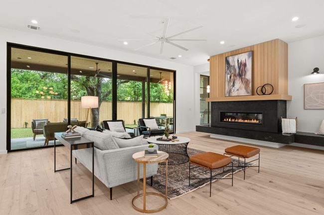 White oak flooring throughout the living spaces. | Image 6