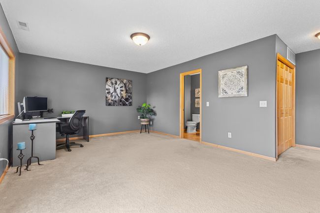 This large lower lever family room is perfect for adding a 2nd living space | Image 22