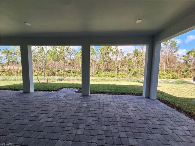 Spacious covered lanai backyard space can accommodate pool after closing | Image 8