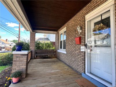 The 19x08 covered front porch is a perfect place to prepare for the day with your finest morning blend or unwind with that evening relaxation of your choice. | Image 3