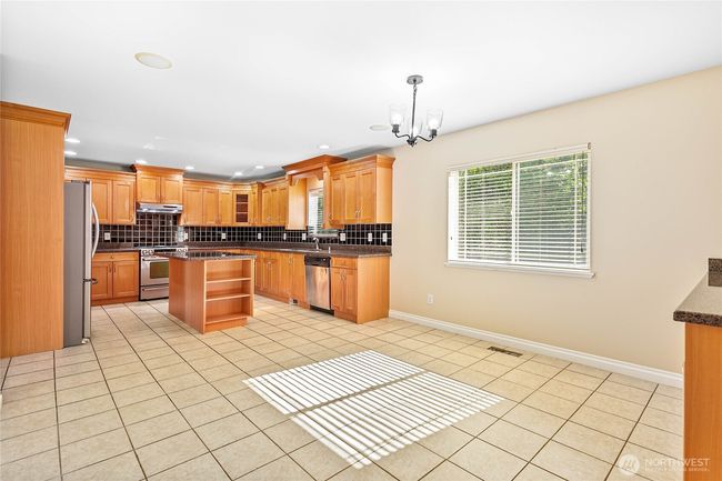 Kitchen with dining area | Image 17