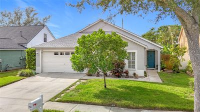 1702 Meadow Oak Lane, House other with 3 bedrooms, 2 bathrooms and null parking in TARPON SPRINGS FL | Image 1