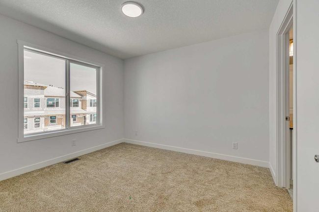 303 - 65 Belvedere Pt Se, Townhouse with 2 bedrooms, 3 bathrooms and 2 parking in Calgary AB | Image 15