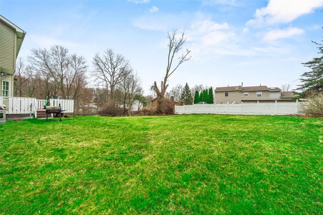 View of yard with fence | Image 47
