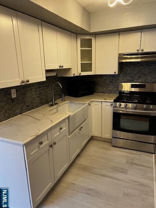 2215 Grand Ave, North Bergen, NJ, 07047-2049 | Card Image