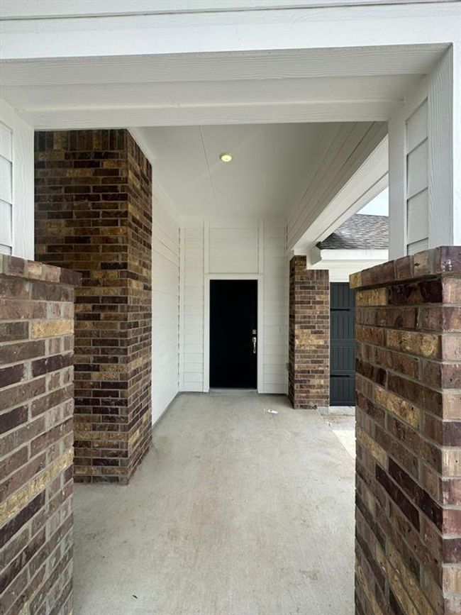 Entrance to property with brick siding | Image 4
