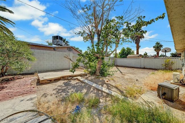 Fenced backyard featuring a patio | Image 38
