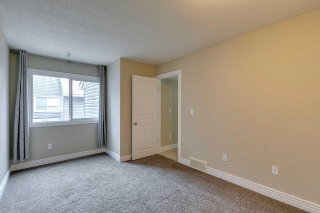 286 - 87 Glamis Green Sw, Home with 2 bedrooms, 1 bathrooms and 1 parking in Calgary AB | Image 10