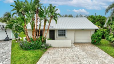 49 Aqua Ra Drive, House other with 2 bedrooms, 2 bathrooms and null parking in Jensen Beach FL | Image 1