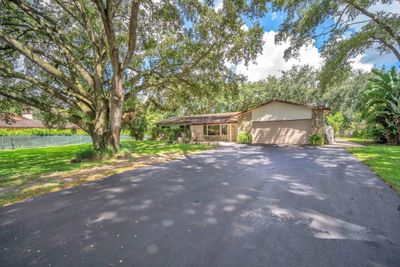 11001 Sw 51st St, House other with 4 bedrooms, 2 bathrooms and null parking in Davie FL | Image 2