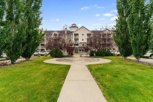 112 - 11230 104, Condo with 2 bedrooms, 2 bathrooms and 2 parking in Grande Prairie AB | Card Image