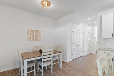 Dining room featuring light hardwood / wood-style floors | Image 1