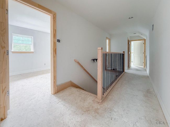 Second level features three bedrooms and secondary bathroom | Image 22