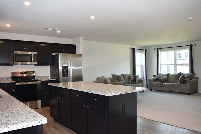 Kitchen with view of great room | Image 19