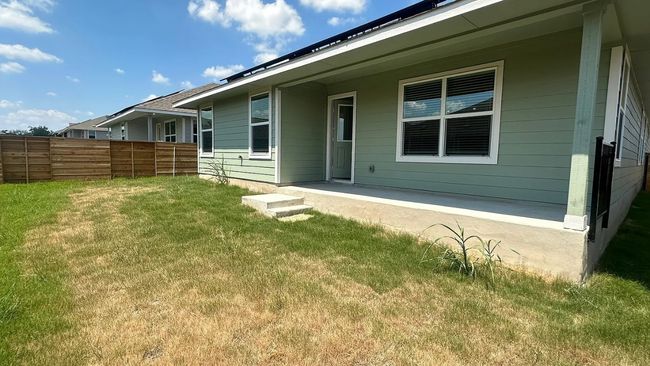 Rear view of house with a patio area | Image 34