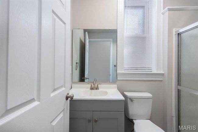 Full bath with vanity and a stall shower | Image 10