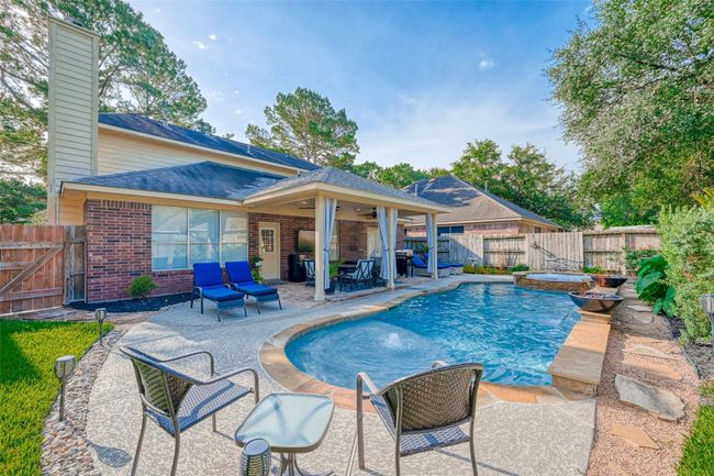 Heated Pool/Spa with 2 fire bowls & backyard. | Image 46