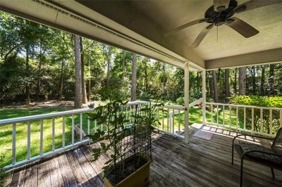 Year round enjoyment watching the deer, rabbits, squirrels, etc. with this tranquil view from your wrap-around porch. | Image 1