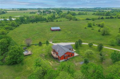 Aerial view of home and barn | Image 1