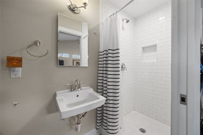 Bathroom with a shower stall | Image 19